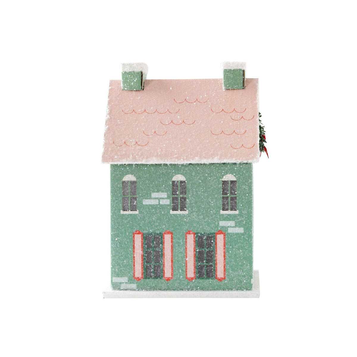 Back view of the mint Christmas house showing the pink glitter roof and shuttered windows