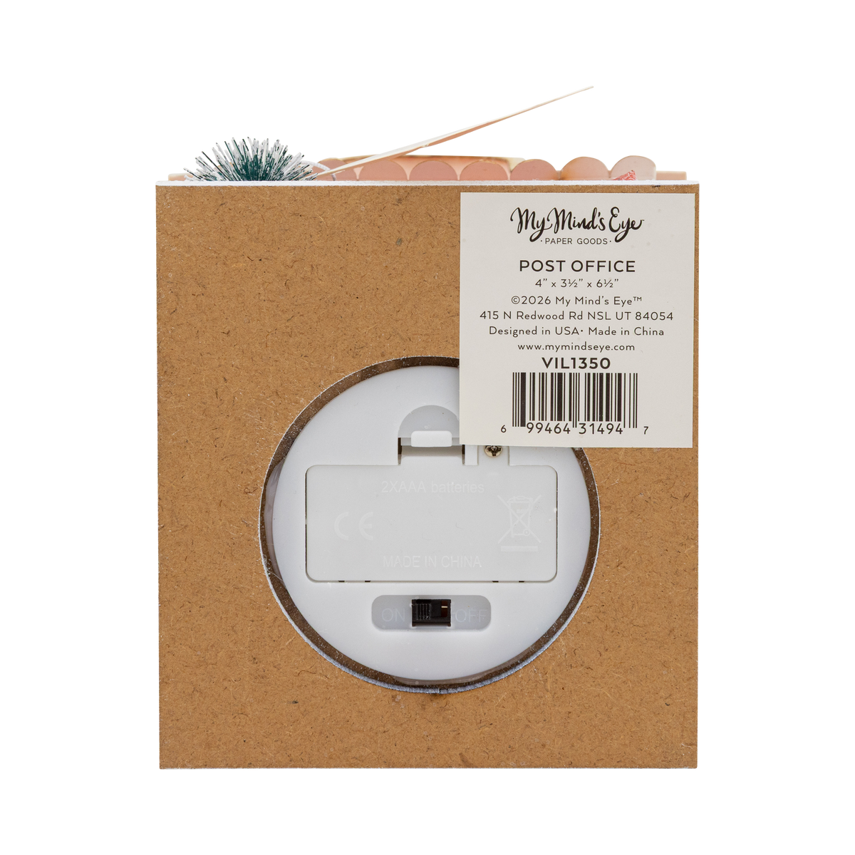Back of post office paper house showing battery compartment and on off switch