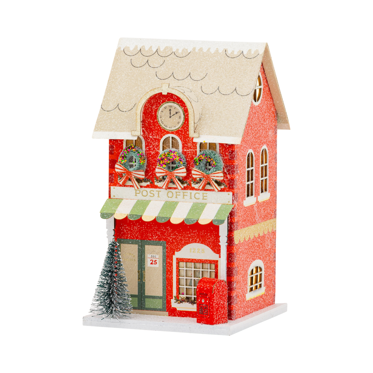 Red glitter Christmas village post office with snowy roof, clock, wreaths, and tiny red mailbox