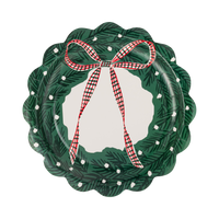 Green die-cut Christmas wreath plate with red and cream dot accents and a gingham bow on a white background.