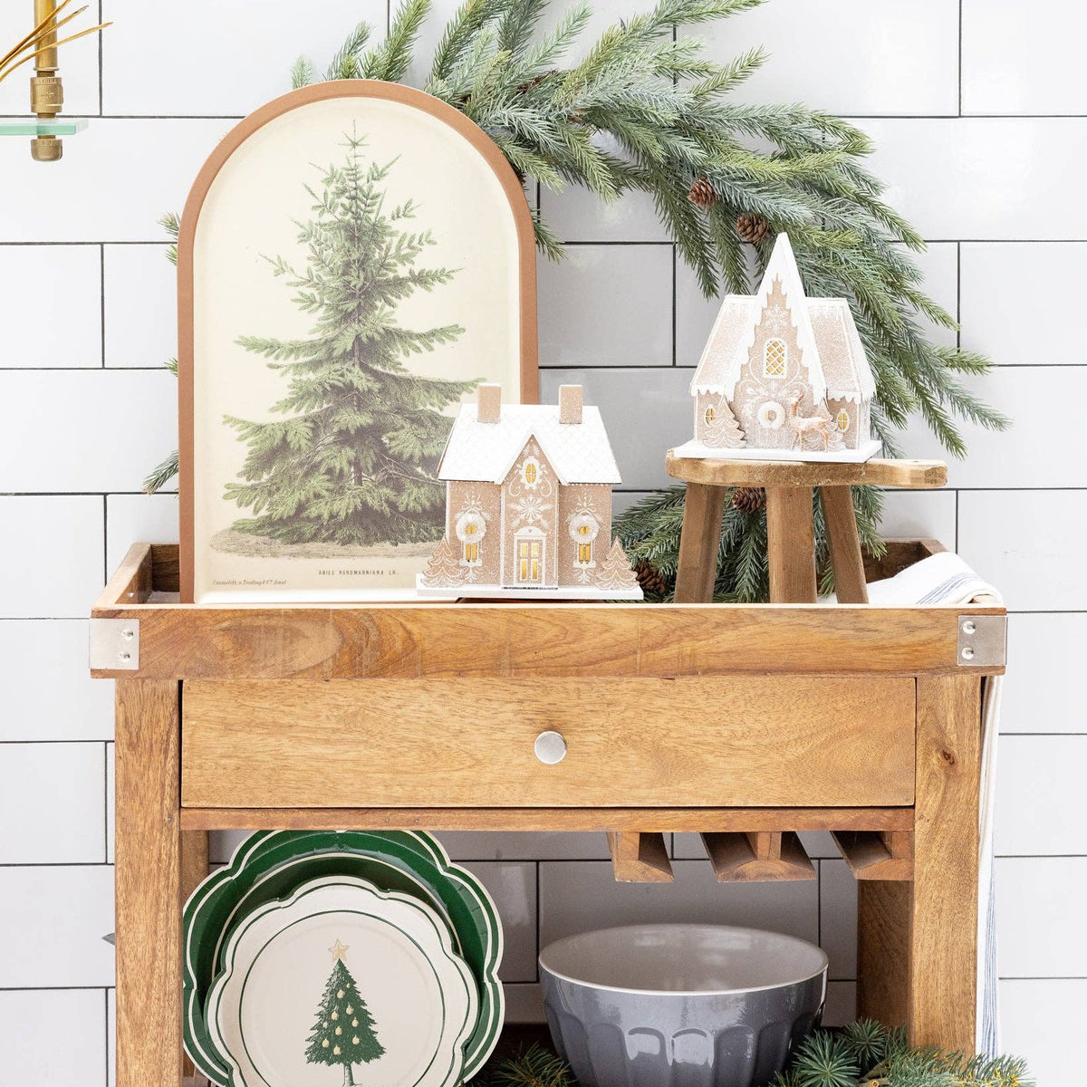 Stylized kitchen cart display with the Christmas tray and gingerbread houses, showcasing the Eco-friendly holiday decor potential.