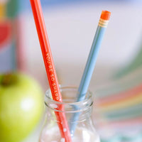 Close up of pencil straw with “you’re so sharp” text.