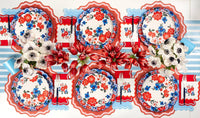 Overhead tablescape view of Floral Patriotic Plates and Americana Floral Tableware for a summer celebration.