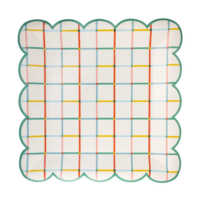Colorful grid scalloped paper plate front view.