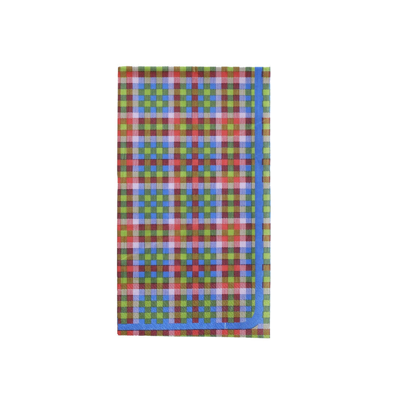 Overhead studio shot of a rectangular paper guest towel featuring a colorful plaid pattern of red, green, pink, and blue, framed by a solid blue border.