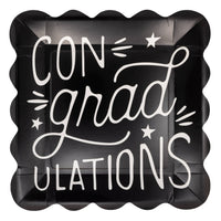 Black ConGRADulations graduation party plate with scalloped edges and bold white lettering
