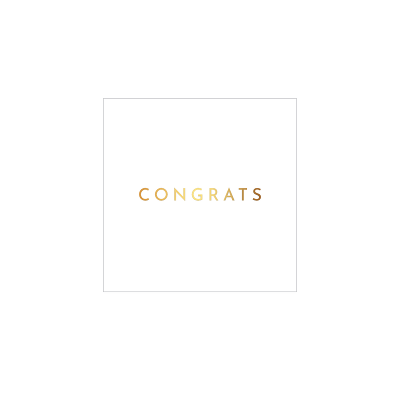 Gold-foil "Congrats" lettering centered on a white cocktail napkin, showing the clean white-and-gold design of the set.
