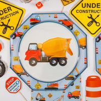 construction themed table with dessert plates and decor