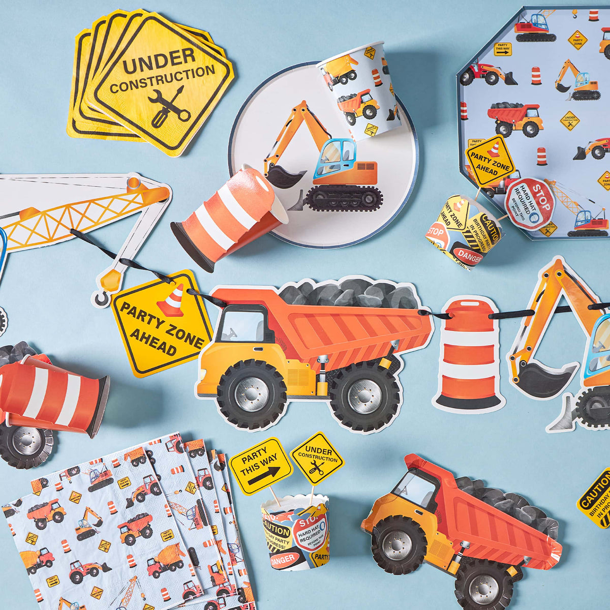 construction party setup with plates and truck decorations