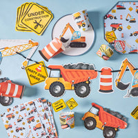 construction party setup with plates and truck decorations