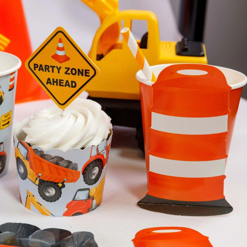 construction party table with barricade cup and cupcake topper