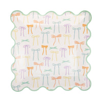 A single square paper plate with a delicate bow design in pastel colors and a green scalloped edge.