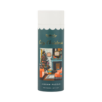 Cozy Christmas 500 piece jigsaw puzzle tube with a cozy Christmas scene and gold foil accents