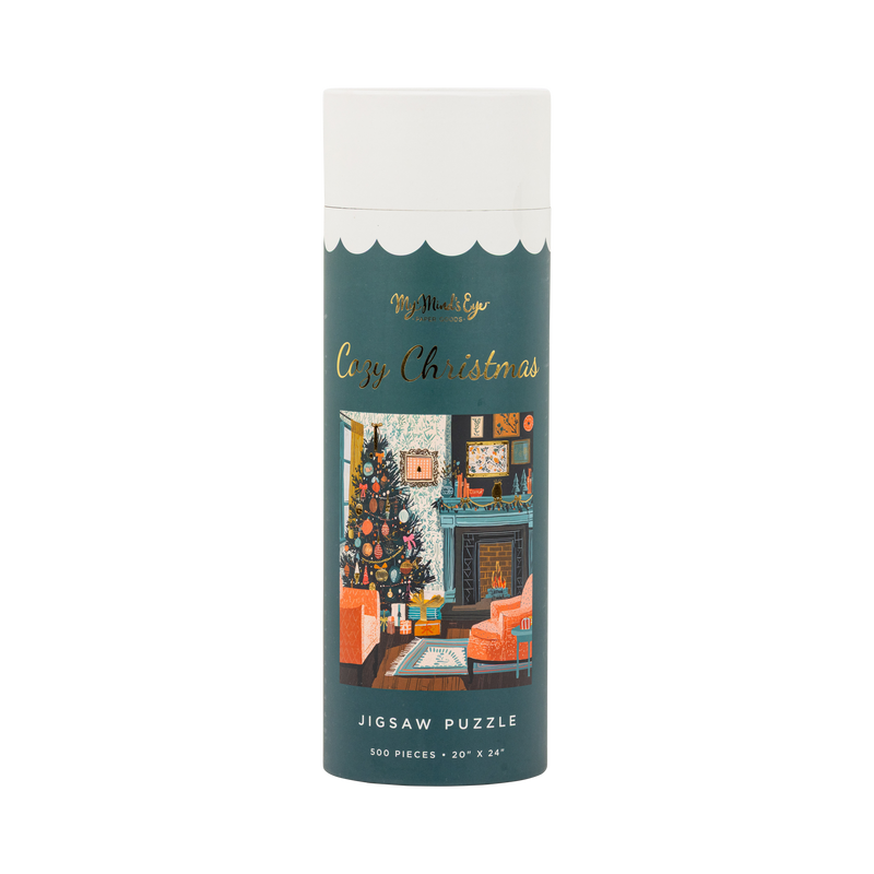 Cozy Christmas 500 piece jigsaw puzzle tube with a cozy Christmas scene and gold foil accents