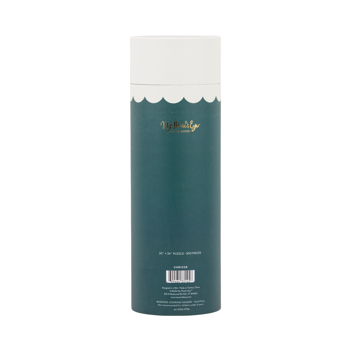 Cozy Christmas puzzle tube styled with other holiday puzzles among greenery and gift boxes