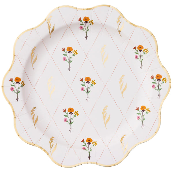 Single round dinner plate with cozy fall floral pattern and gold rim, front view.