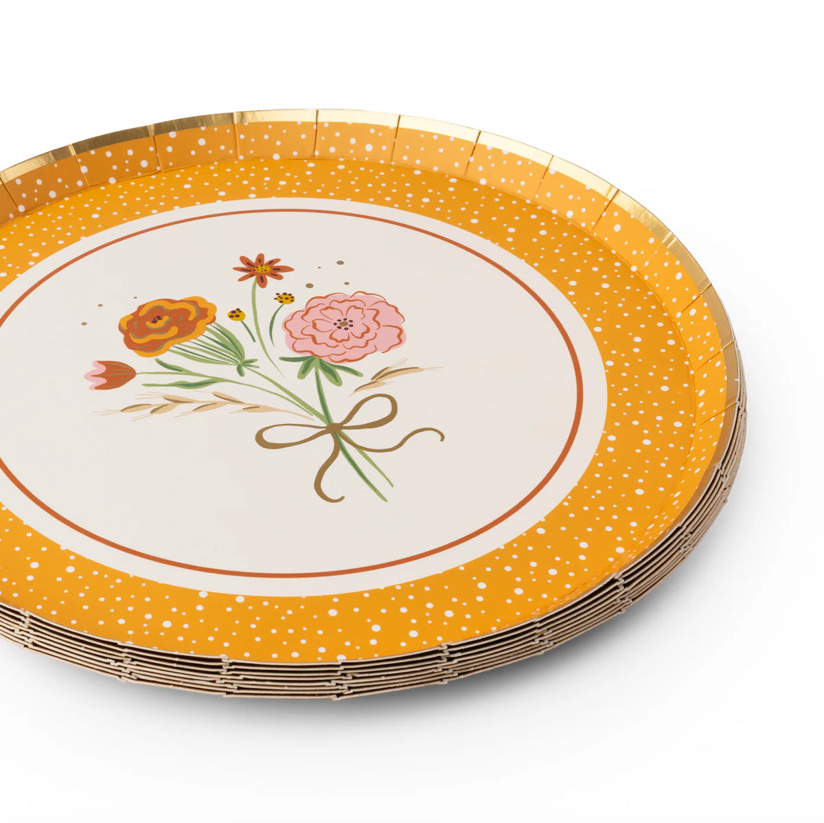 Side angle of stacked floral dessert plates highlighting the gold-foil rim.