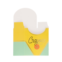 Single unassembled flat crayon treat box on white background, front-facing. Die-cut open top clearly shows the two-scallop cutout. Yellow upper section with "Crayons" in black script and "8" on orange badge, mint green lower panel.