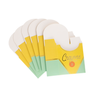 Six unassembled crayon treat boxes fanned out against a white background, showing the flat die-cut shape — yellow upper section with "Crayons 8" script and characteristic open-top scalloped silhouette, mint green lower section.