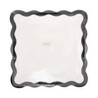 Packaged cream and black scalloped square plates.