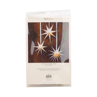 Packaging showing the three cream paper stars styled together.