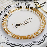 A Congrats Grad plate featuring a black and white striped border, perfect as a Commencement Dessert Bar staple.