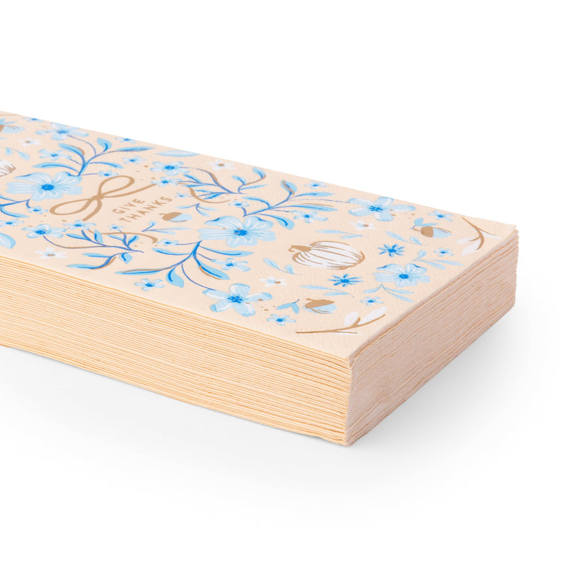 Angled stack of blue floral Give Thanks paper guest towels