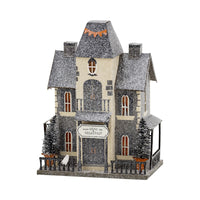 Dead & Breakfast light-up haunted house with glitter finish on a white background—vintage Halloween village decor.