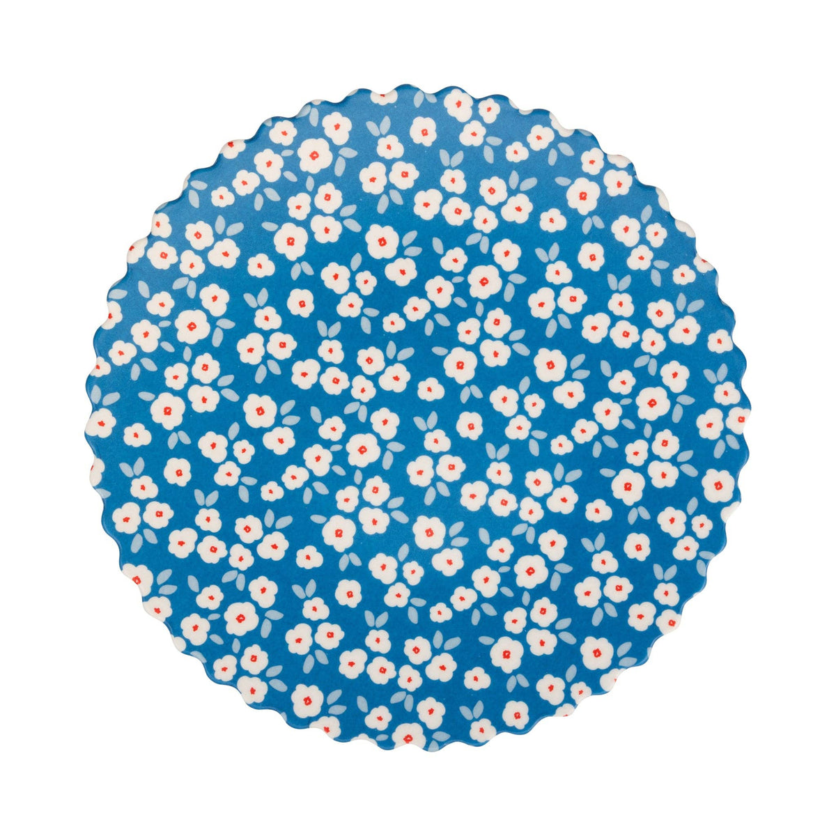 Flat lay of deep blue floral bamboo plate with white daisy pattern and red centers on white background