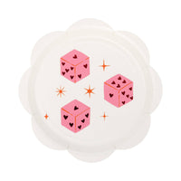 Round scalloped paper plate with pink dice and heart designs