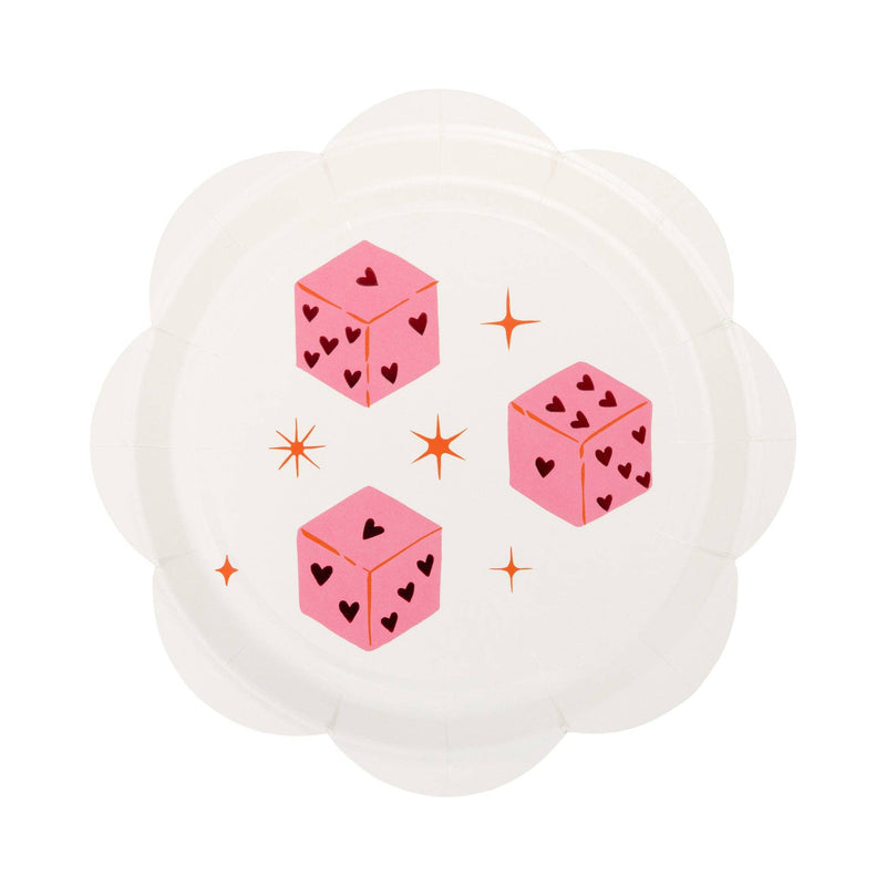 Round scalloped paper plate with pink dice and heart designs