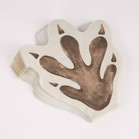 Pile of dinosaur footprint napkins showing quantity

