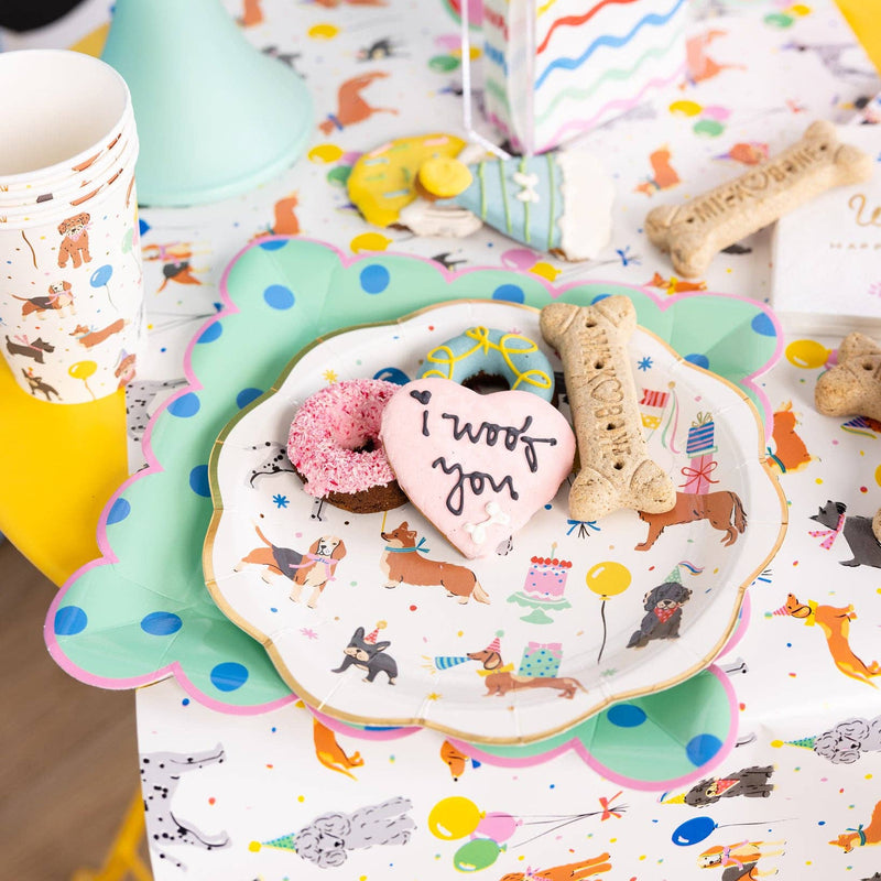 Dog birthday dessert table styled with Dog Party Table Runner and treats