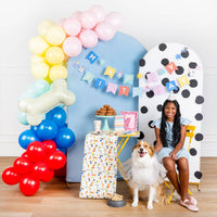 Dog themed party setup with balloon arch and Dog Party Table Runner