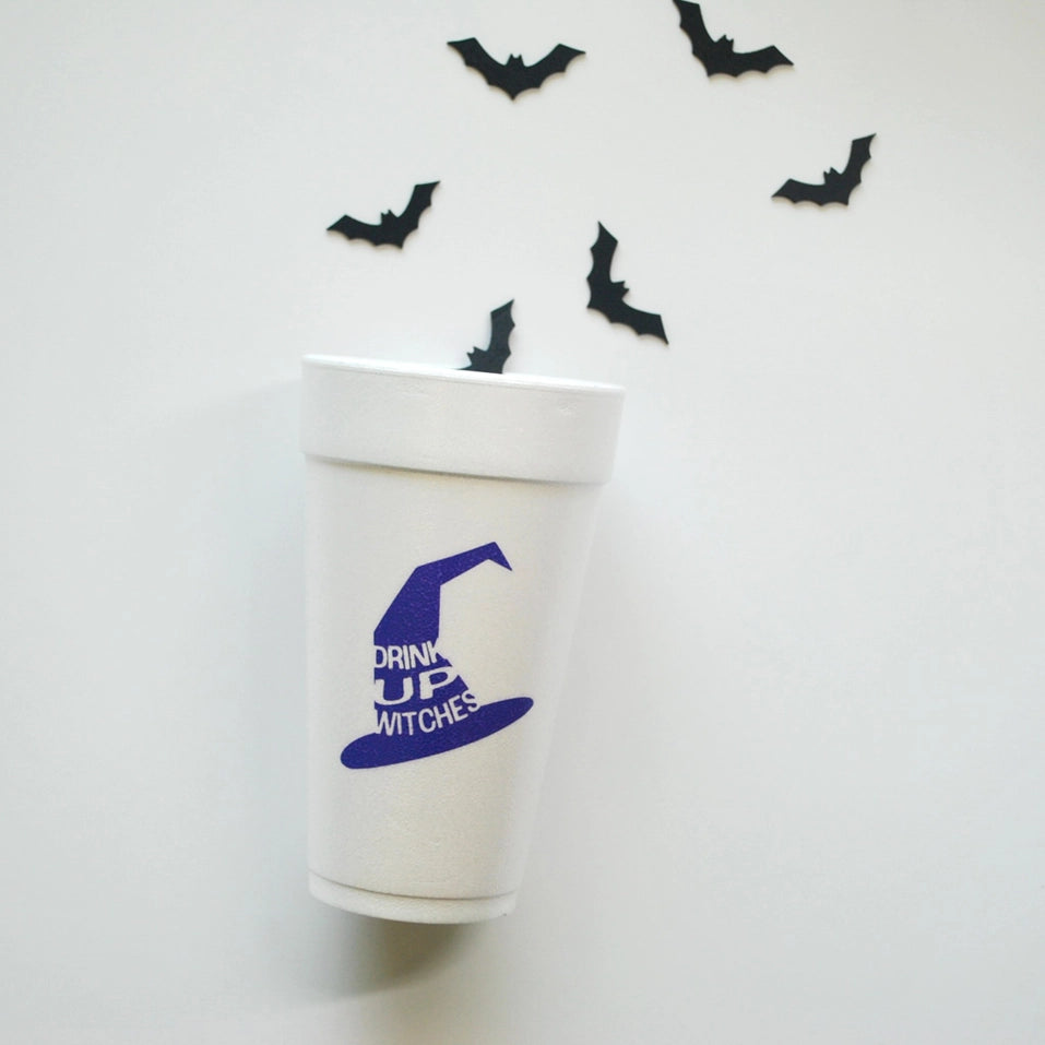 Single 20oz ‘Drink Up Witches’ foam cup with purple witch-hat graphic and flying bat décor—recyclable, BPA-free Halloween cup.
