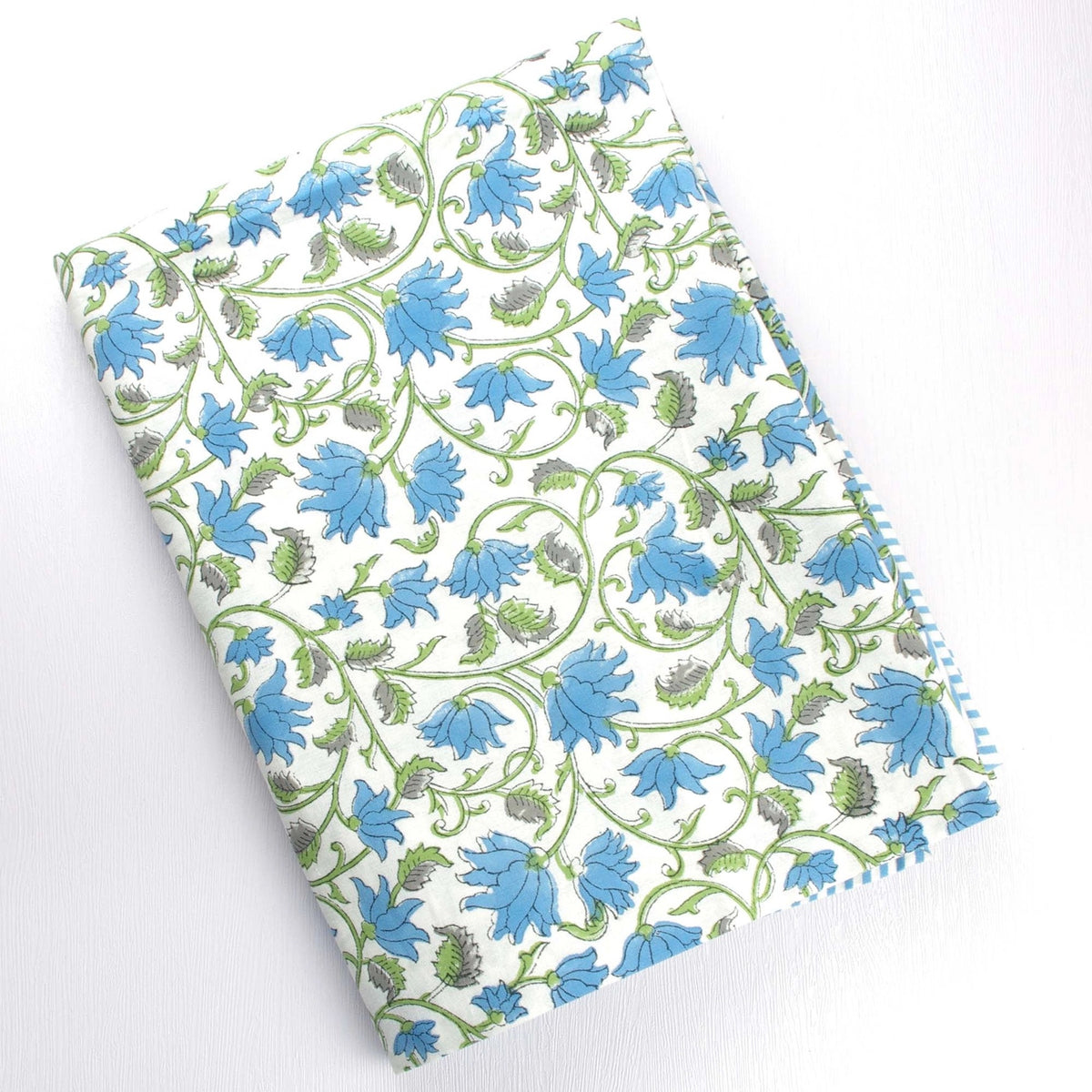 Blue Tablecloth perfect for an Easter or Spring table. This floral tablecloth is 100% block print cotton.
