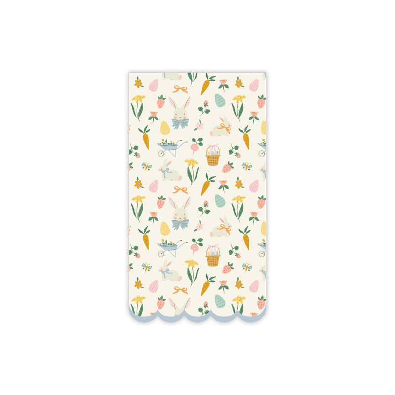 Easter pattern dinner napkin with pastel bunnies, florals, carrots, and scalloped edge
