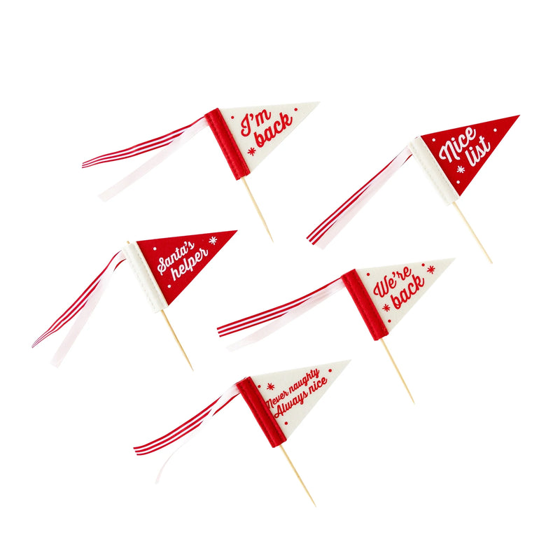 Set of five Elf Mini Felt Pennant Flags laid out flat showing designs like ‘I’m back’ and ‘Santa’s helper.’