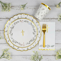 eucalyptus napkin styled with plate and gold fork
