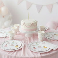 Full party table with princess place settings and pearl-draped cake