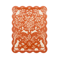 Fall bamboo serving tray in rust and cream with a scalloped edge and folk-art woodland illustration of deer, birds, acorns, and oak leaves, overhead view on white background.