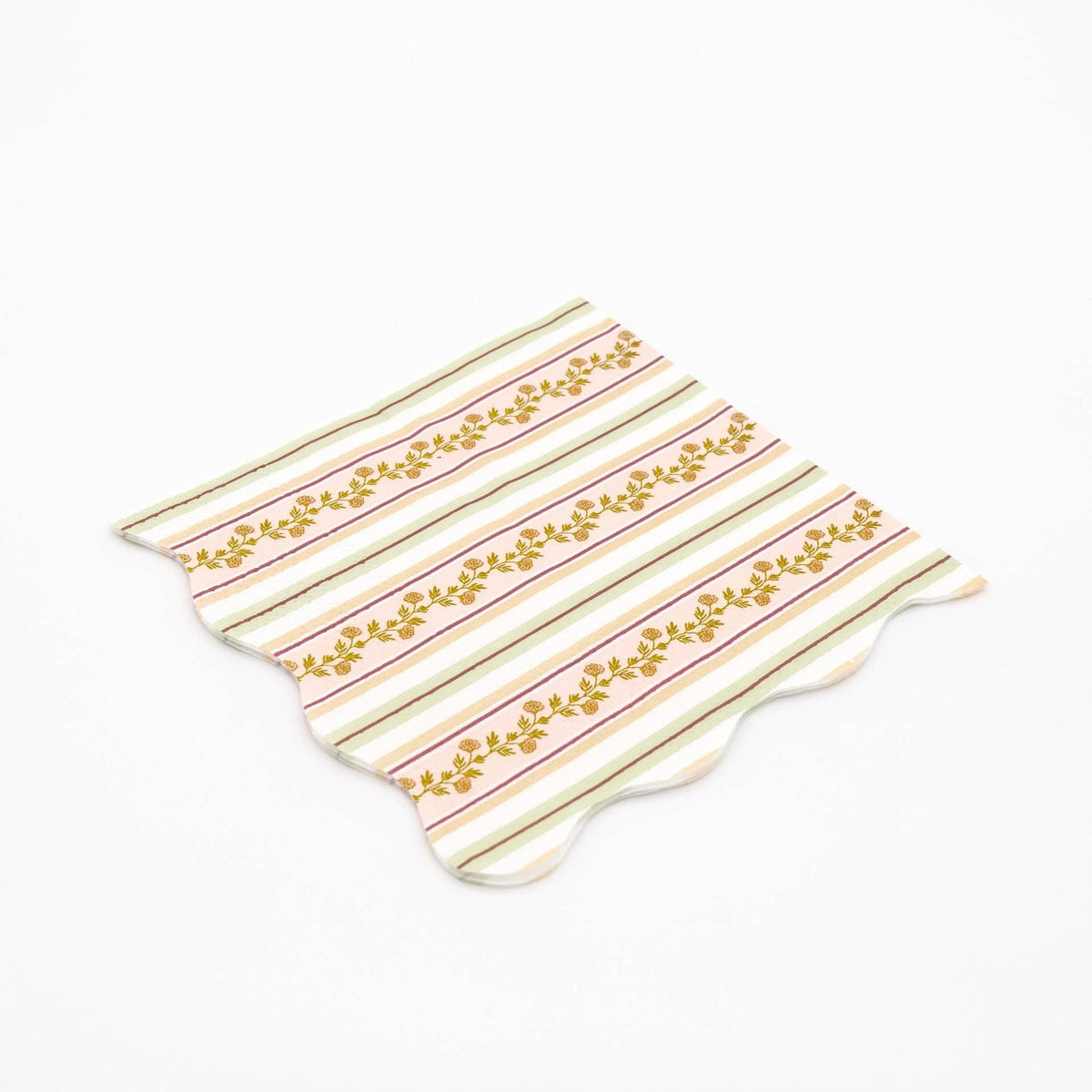 Close-up of the fall cocktail napkin showing the floral vines and multi-tonal stripe detail.