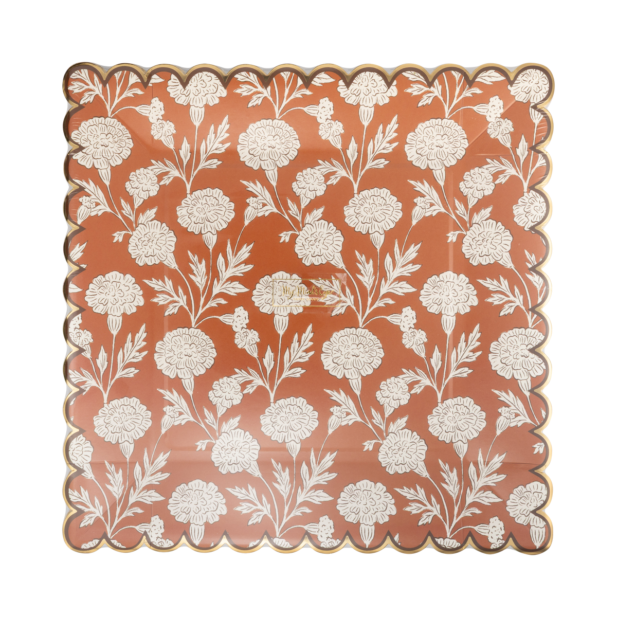 Clear packaging close-up of the cream floral print and copper foil scalloped edge, front view.