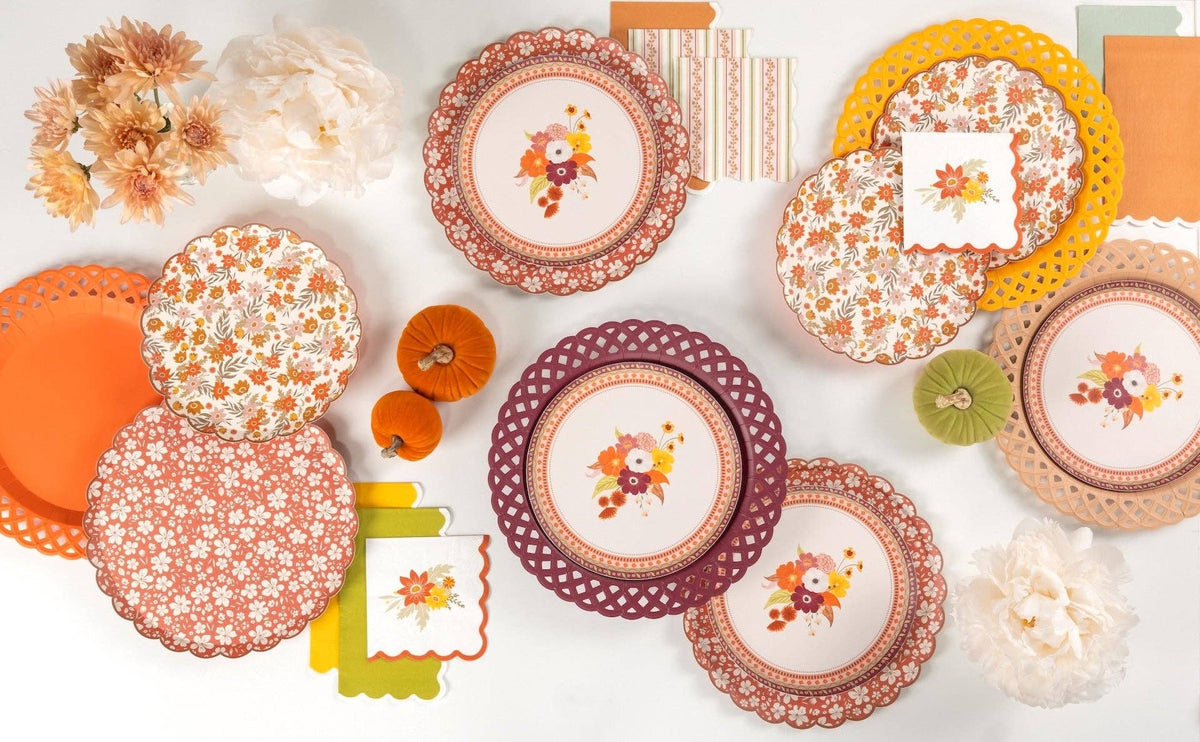 Rust fall floral plate shown with a wider fall collection of bouquet plates, chargers, and velvet pumpkins
