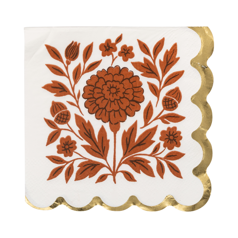 Cream cocktail napkin with orange floral design and a gold foil scalloped edge, front view.