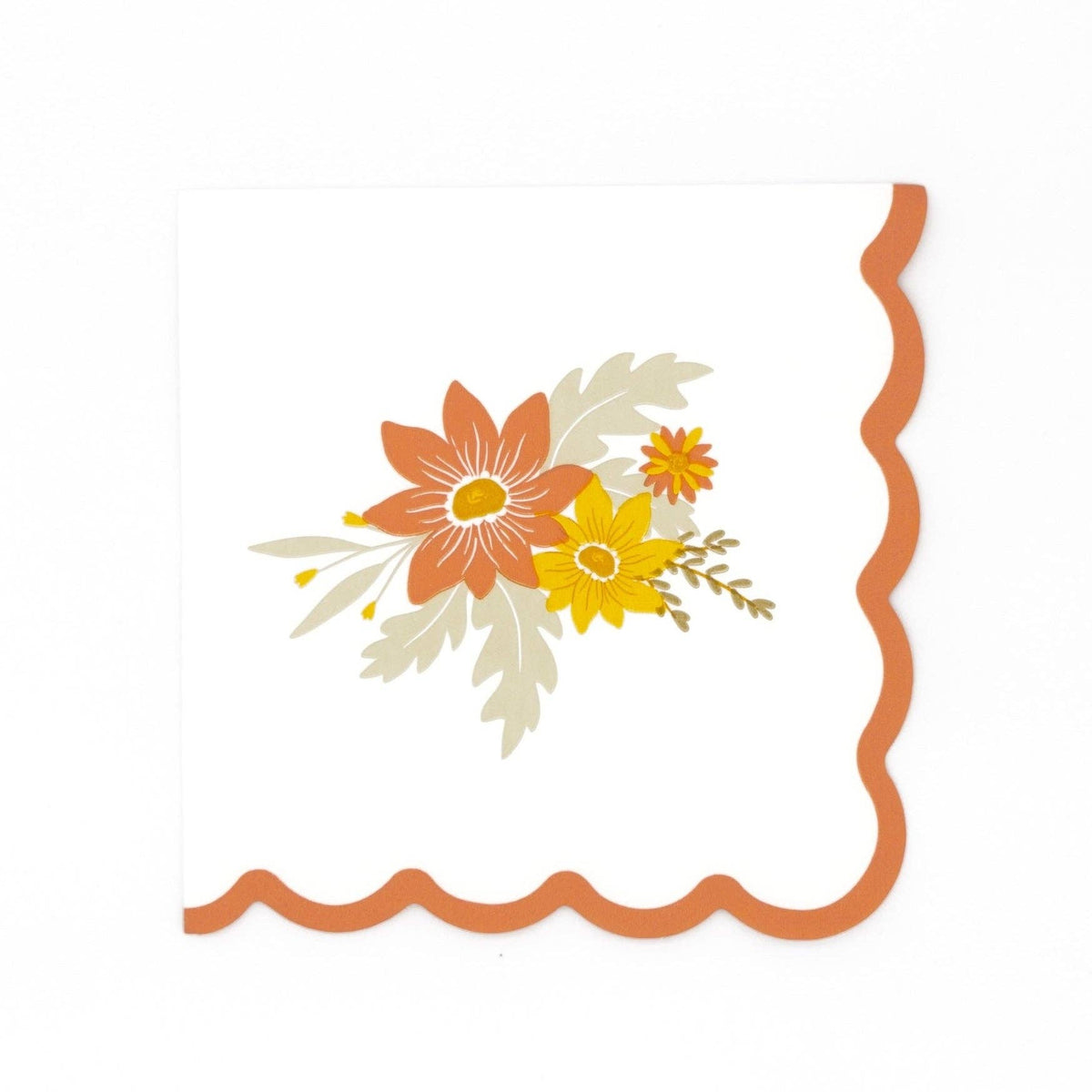 White cocktail napkin with a fall floral bouquet print and rust scalloped edge on a white background