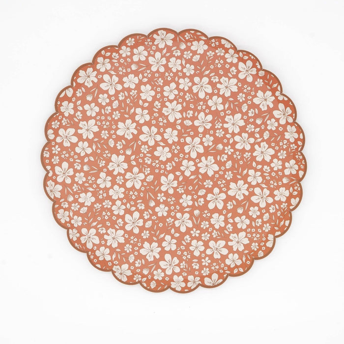 Rust fall floral scalloped paper dinner plate with cream flowers on a terracotta ground