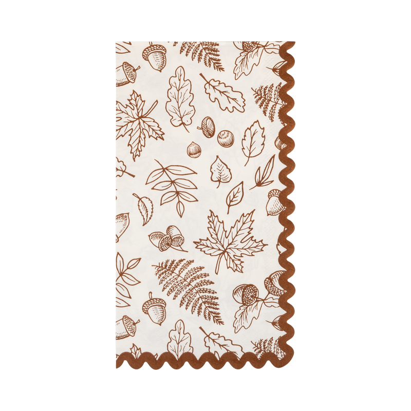 Cream dinner napkin with a brown "gather" foliage illustration and a brown wavy edge.