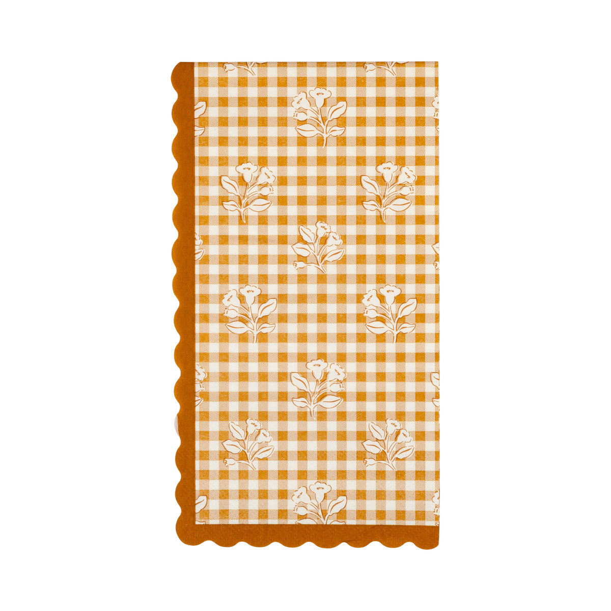 Fall gingham dinner napkin in orange and cream block-print with scattered floral accents and an orange wavy edge, overhead flat-lay.