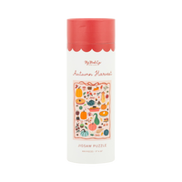 Fall harvest jigsaw puzzle box, cream with a scalloped pink lid, showing the colorful autumn illustration and "Autumn Harvest" label, front view.